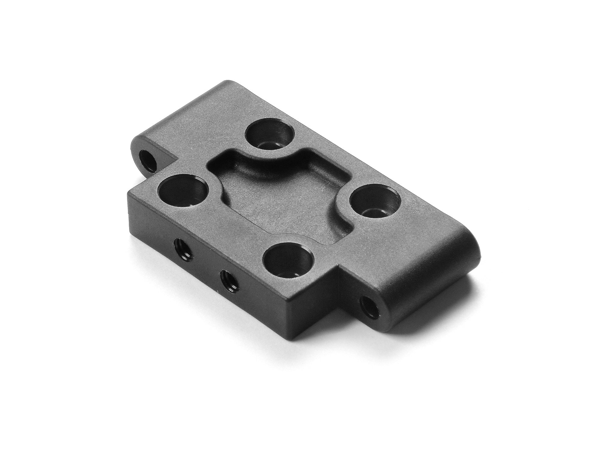 XRAY: COMPOSITE FRONT LOWER ARM MOUNT FOR 1-PIECE CHASSIS